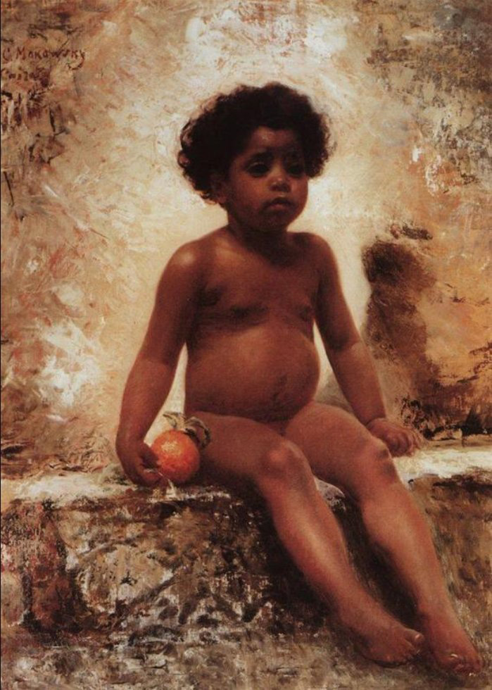 arab boy with an orange